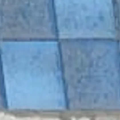 Blue glass mosaic waterline tile